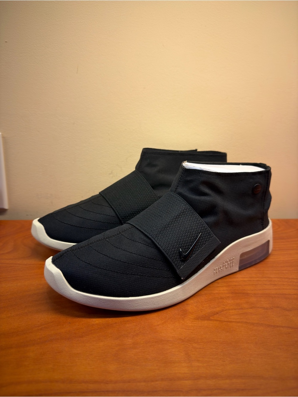 Nike Men’s Black and White Mid-Top Strap Sneakers